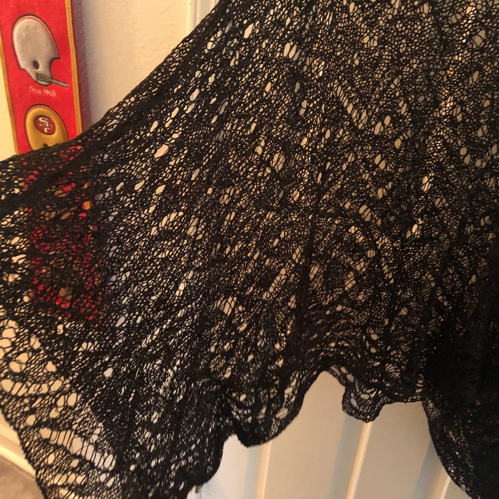 Womans open mesh poncho